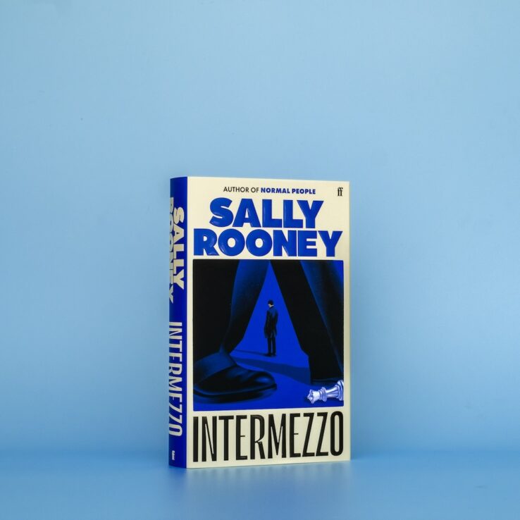 Hardback edition of Sally Rooney's novel Intermezzo on a blue background Hardback edition of Sally Rooney's novel Intermezzo on a blue background