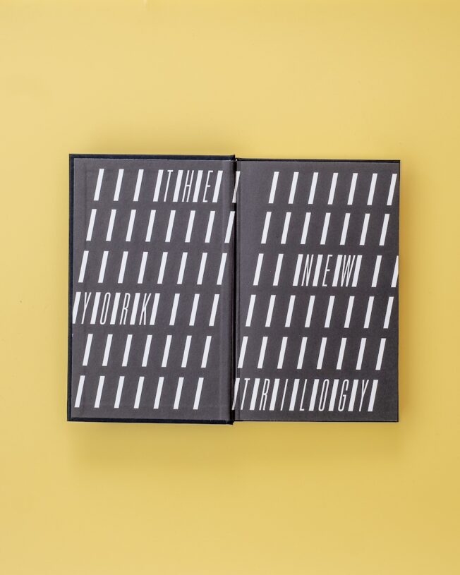 Faber Members Edition of Paul Auster's New York Trilogy on a pale yellow background Faber Members Edition of Paul Auster's New York Trilogy on a pale yellow background