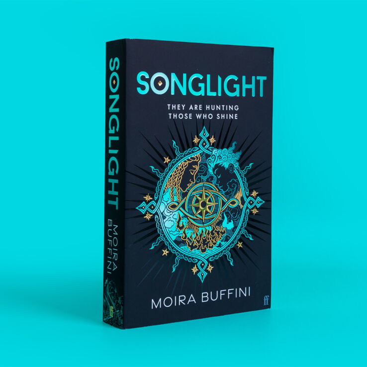 Songlight Trilogy book on a light blue background Songlight Trilogy book on a light blue background